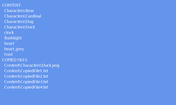 Compiled content names and copied file paths listed on a blue screen.