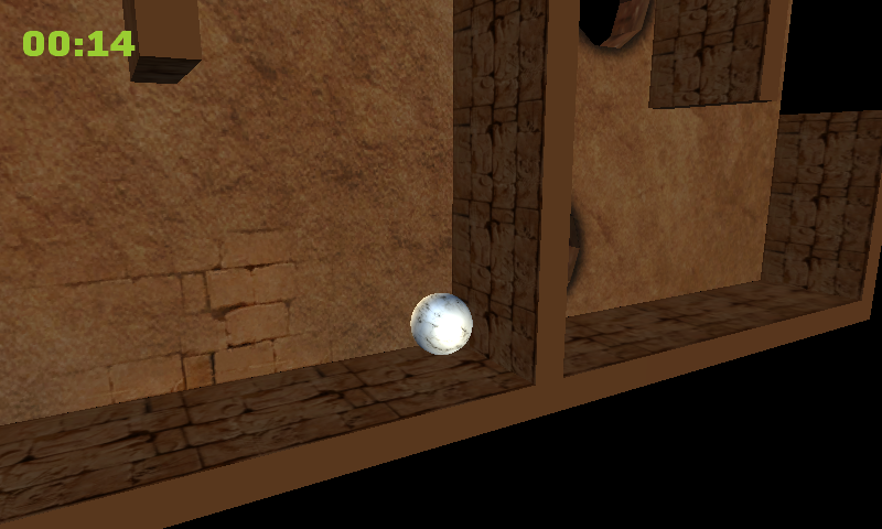 Marble Maze gameplay: a marble rolling through a tilted stone maze, with the timer visible.