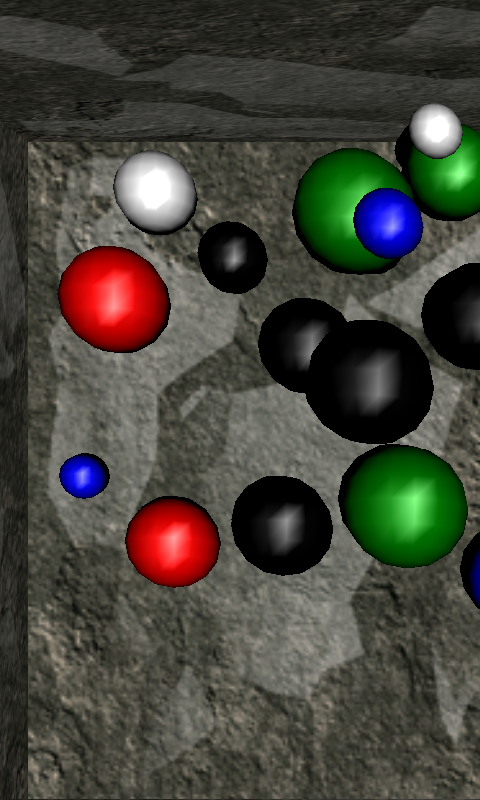 The running sample: coloured balls in a stone box seen from a tilted viewpoint.